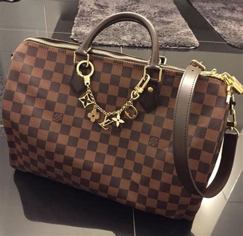 did michael kors buy louis vuitton|does michael kors price match.